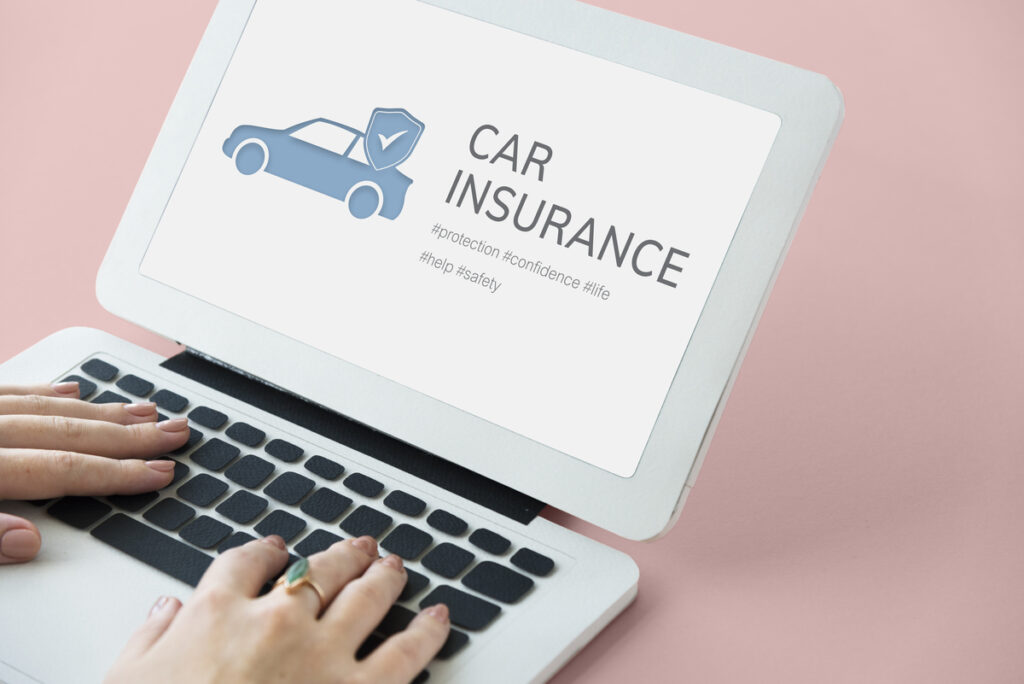 Car insurance on laptop screen 