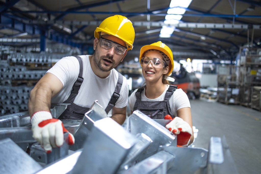 Factory workers working production line